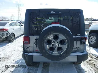 2018 Jeep Wrangler JK Unlimited Sahara with VIN 1C4HJWEG9JL801714, listed as a IAAI auction lot 41591307 with 79,201 mi miles. Bid and sale history available at carsss.com. Image 16.