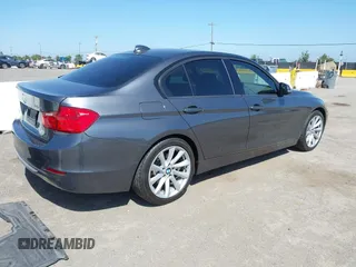 2012 BMW 3 Series 328i with VIN WBA3A5C5XCF342956, listed as a IAAI auction lot 42167647 with 154,972 mi miles and . Bid and sale history available at carsss.com. Image 4.