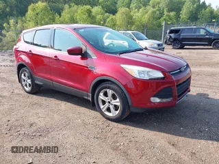 2015 Ford Escape SE z VIN 1FMCU0G75FUA60857, wystawiony jako IAAI lot #42442697 z przebiegiem 211 624 mil mil oraz . Historia ofert i sprzedaży dostępna na DreamBid. Obrazek 1.