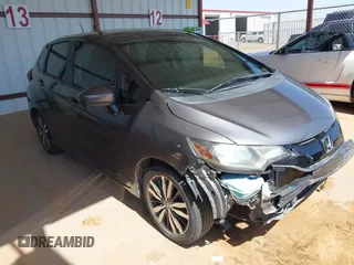 2016 Honda Fit EX z VIN JHMGK5H74GX045286, wystawiony jako IAAI lot #42313084 z przebiegiem 96 616 mil mil oraz . Historia ofert i sprzedaży dostępna na DreamBid. Obrazek 1.