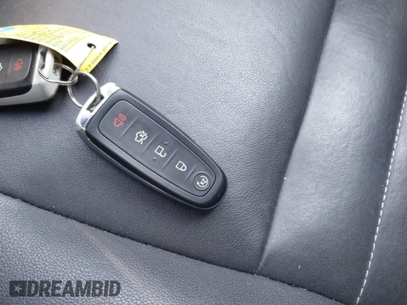 2016 Ford Escape Titanium with VIN 1FMCU9J99GUB27573, listed as a IAAI auction lot 42445457 with 156,784 mi miles and . Bid and sale history available at DreamBid. Image 11.