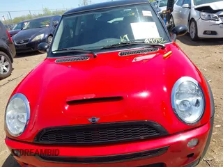2003 MINI Hardtop S z VIN WMWRE33443TD60271, wystawiony jako IAAI lot #42129529 z przebiegiem 94 082 mil mil oraz . Historia ofert i sprzedaży dostępna na DreamBid. Obrazek 12.