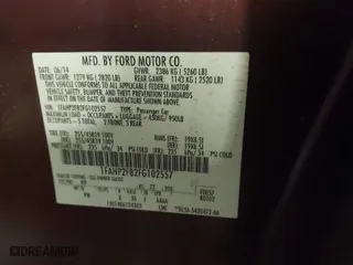 2015 Ford Taurus Limited with VIN 1FAHP2F82FG102557, listed as a IAAI auction lot 41618362 with 110,000 mi miles. Bid and sale history available at carsss.com. Image 9.
