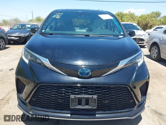 2021 Toyota Sienna XSE with VIN 5TDXRKEC6MS021909, listed as a IAAI auction lot 42432609 with 57,295 mi miles and . Bid and sale history available at DreamBid. Image 12.