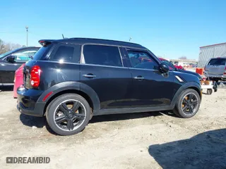 2015 MINI Cooper Countryman S with VIN WMWZC3C5XFWT04916, listed as a IAAI auction lot 41636369 with 101,448 mi miles. Bid and sale history available at carsss.com. Image 13.