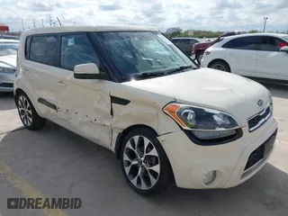 2012 Kia Soul + with VIN KNDJT2A63C7462882, listed as a IAAI auction lot 41162839 with 102,904 mi miles. Bid and sale history available at carsss.com. Image 1.