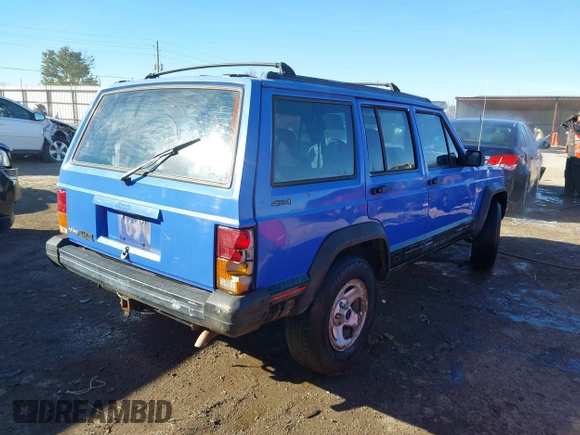 1996 Jeep Cherokee Sport with VIN 1J4FJ68S6TL171428, listed as a IAAI auction lot 40881632 with 323,289 mi miles. Bid and sale history available at carsss.com. Image 4.