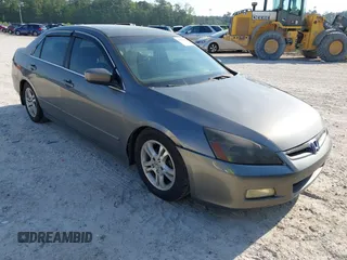 2006 Honda Accord EX-L z VIN 1HGCM56876A147156, wystawiony jako IAAI lot #42035408 z przebiegiem 386 761 mil mil oraz . Historia ofert i sprzedaży dostępna na DreamBid. Obrazek 1.