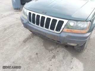 2003 Jeep Grand Cherokee Laredo with VIN 1J4GW48S93C583644, listed as a IAAI auction lot 41656314 with 256,653 mi miles. Bid and sale history available at carsss.com. Image 6.