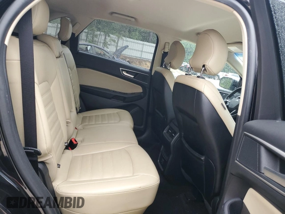 2019 Ford Edge SEL z VIN 2FMPK4J9XKBB10418, wystawiony jako Copart lot #58368335 z przebiegiem 97 458 mil mil oraz Czysty tytuł • Clean title. Historia ofert i sprzedaży dostępna na DreamBid. Obrazek 11.
