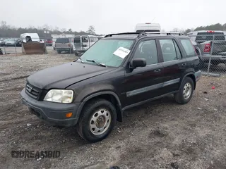 1998 Honda CR-V LX with VIN JHLRD2841WC011503, listed as a IAAI auction lot 41554309 with 231,015 mi miles. Bid and sale history available at carsss.com. Image 2.