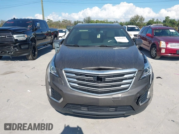 2019 Cadillac XT5 FWD with VIN 1GYKNARS5KZ143510, listed as a IAAI auction lot 41553279 with 53,943 mi miles and . Bid and sale history available at carsss.com. Image 12.