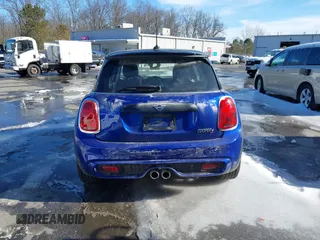 2020 MINI Hardtop Cooper S z VIN WMWXR5C05L2L43423, wystawiony jako IAAI lot #41577721 z przebiegiem 108 123 mil mil oraz . Historia ofert i sprzedaży dostępna na DreamBid. Obrazek 16.