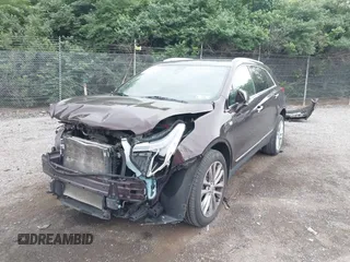 2017 Cadillac XT5 Platinum AWD z VIN 1GYKNFRS2HZ224860, wystawiony jako IAAI lot #42272142 z przebiegiem 95 697 mil mil oraz . Historia ofert i sprzedaży dostępna na DreamBid. Obrazek 19.