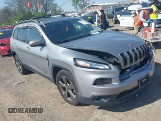 2016 Jeep Cherokee 75th Anniversary with VIN 1C4PJLCB5GW287420, listed as a IAAI auction lot 41984043 with 145,577 mi miles. Bid and sale history available at carsss.com. Image 1.