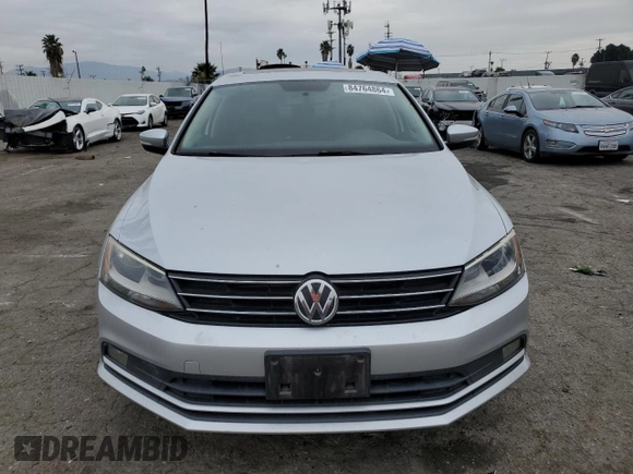 2015 Volkswagen Jetta SE with VIN 3VWD17AJ5FM260475, listed as a Copart auction lot 84764864 with 119,189 mi miles and Salvage title. Bid and sale history available at DreamBid. Image 5.