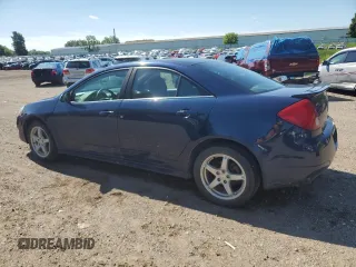 2009 Pontiac G6 1SB with VIN 1G2ZJ57K694272894, listed as a Copart auction lot 63006935 with 125,640 mi miles and Clean title. Bid and sale history available at DreamBid. Image 2.