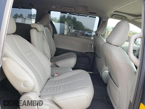 2014 Toyota Sienna XLE z VIN 5TDYK3DC2ES437683, wystawiony jako Copart lot #60549975 z przebiegiem 145 608 mil mil oraz Szkoda całkowita • Salvage title. Historia ofert i sprzedaży dostępna na DreamBid. Obrazek 10.
