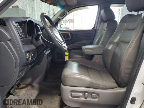 2010 Honda Ridgeline RTL z VIN 5FPYK1F53AB006195, wystawiony jako Copart lot #52528435 z przebiegiem 205 522 mil mil oraz Szkoda całkowita • Salvage title. Historia ofert i sprzedaży dostępna na DreamBid. Obrazek 7.