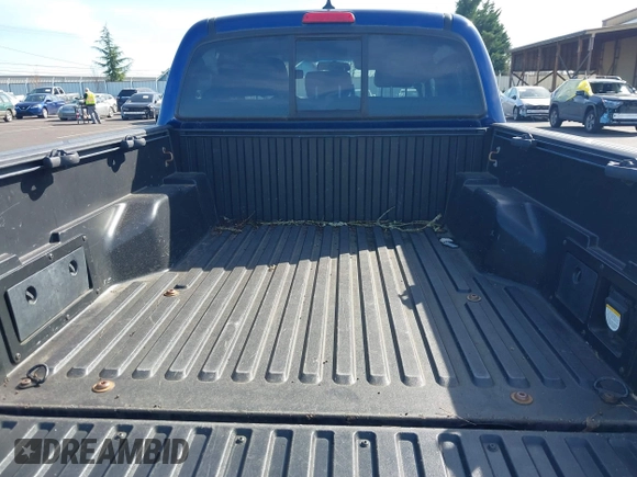 2015 Toyota Tacoma with VIN 3TMLU4ENXFM177755, listed as a IAAI auction lot 41867145 with 123,551 mi miles and . Bid and sale history available at DreamBid. Image 17.