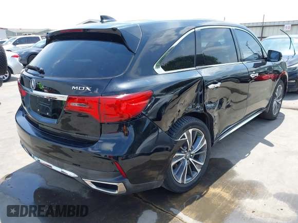 2019 Acura MDX Technology z VIN 5J8YD3H51KL000634, wystawiony jako IAAI lot #42056934 z przebiegiem 103 411 mil mil oraz . Historia ofert i sprzedaży dostępna na DreamBid. Obrazek 6.