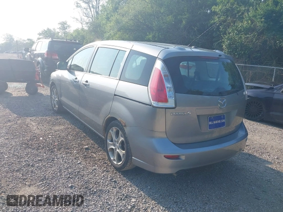 2010 Mazda 5 Sport with VIN JM1CR2W32A0385045, listed as a IAAI auction lot 42451448 with 127,762 mi miles and . Bid and sale history available at DreamBid. Image 3.