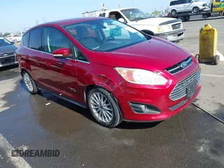 2013 Ford C-Max SEL z VIN 1FADP5CU4DL555035, wystawiony jako IAAI lot #42355498 z przebiegiem 172 374 mil mil oraz . Historia ofert i sprzedaży dostępna na DreamBid. Obrazek 1.