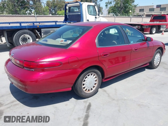 1997 Mercury Sable GS z VIN 1MELM50U6VG651910, wystawiony jako IAAI lot #42494879 z przebiegiem 70 304 mil mil oraz . Historia ofert i sprzedaży dostępna na DreamBid. Obrazek 4.