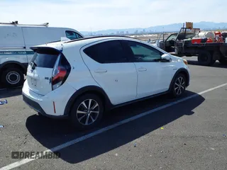 2018 Toyota Prius One with VIN JTDKDTB32J1599890, listed as a IAAI auction lot 42009820 with 57,959 mi miles and . Bid and sale history available at DreamBid. Image 4.