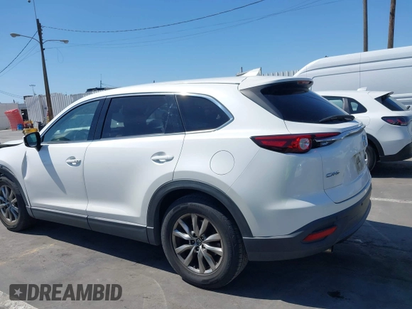 2019 Mazda CX-9 Touring with VIN JM3TCACY5K0306424, listed as a IAAI auction lot 42150466 with 95,166 mi miles and . Bid and sale history available at DreamBid. Image 14.