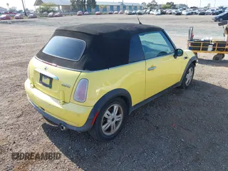 2005 MINI Convertible with VIN WMWRF33435TG11068, listed as a IAAI auction lot 42346035 with 147,367 mi miles and . Bid and sale history available at DreamBid. Image 4.