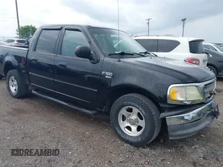 2003 Ford F-150 XLT with VIN 1FTRW07L13KD70114, listed as a IAAI auction lot 42455630 with 215,089 mi miles and . Bid and sale history available at DreamBid. Image 1.