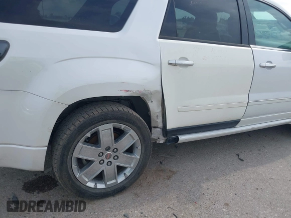 2016 GMC Acadia Denali with VIN 1GKKVTKD2GJ214010, listed as a IAAI auction lot 42082570 with 143,754 mi miles. Bid and sale history available at carsss.com. Image 6.