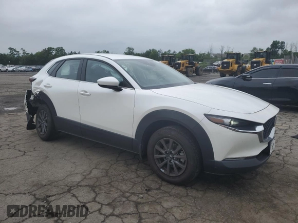2023 Mazda CX-30 S with VIN 3MVDMBAM8PM557537, listed as a Copart auction lot 61154835 with 23,450 mi miles and Salvage title. Bid and sale history available at DreamBid. Image 4.