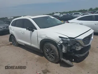 2021 Mazda CX-9 Touring with VIN JM3TCACY9M0526376, listed as a IAAI auction lot 42264478 with 74,671 mi miles and . Bid and sale history available at DreamBid. Image 1.