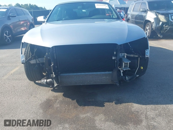 2016 Audi A5 Premium with VIN WAUD2AFHXGN005246, listed as a IAAI auction lot 42595647 with 56,602 mi miles and . Bid and sale history available at DreamBid. Image 6.