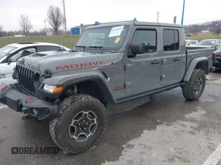2022 Jeep Gladiator Mojave z VIN 1C6JJTEG8NL130971, wystawiony jako IAAI lot #41163074 z przebiegiem 47 142 mil mil oraz . Historia ofert i sprzedaży dostępna na DreamBid. Obrazek 2.