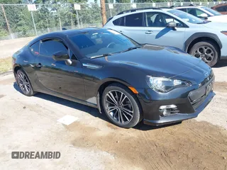 2016 Subaru BRZ Premium z VIN JF1ZCAB11G9600953, wystawiony jako IAAI lot #42407975 z przebiegiem 70 057 mil mil oraz . Historia ofert i sprzedaży dostępna na DreamBid. Obrazek 1.