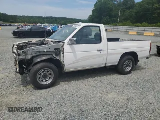 1995 Nissan Frontier with VIN 1N6SD11S0SC458980, listed as a Copart auction lot 56734575 with 265,946 mi miles and Salvage title. Bid and sale history available at DreamBid. Image 1.