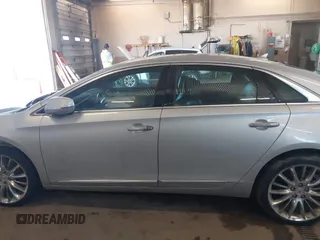 2013 Cadillac XTS Platinum with VIN 2G61V5S31D9190738, listed as a IAAI auction lot 41657461 with 136,924 mi miles and . Bid and sale history available at carsss.com. Image 15.