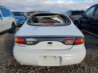 1997 Ford Taurus GL z VIN 1FALP52U1VG253340, wystawiony jako Copart lot #44081395 z przebiegiem 210 117 mil mil oraz Szkoda całkowita • Salvage title. Historia ofert i sprzedaży dostępna na DreamBid. Obrazek 6.