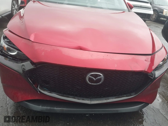 2019 Mazda 3 Preferred z VIN JM1BPAMM2K1135386, wystawiony jako IAAI lot #40367062 z przebiegiem 9 999 mil mil oraz . Historia ofert i sprzedaży dostępna na DreamBid. Obrazek 12.