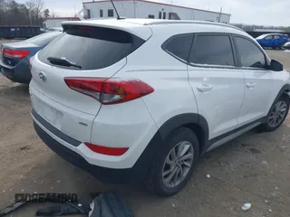 2017 Hyundai Tucson SE with VIN KM8J3CA48HU556569, listed as a IAAI auction lot 41378853 with 67,832 mi miles. Bid and sale history available at carsss.com. Image 4.