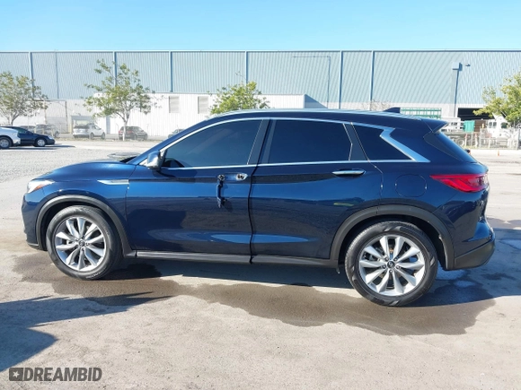 2021 Infiniti QX50 LUXE with VIN 3PCAJ5BB1MF119650, listed as a IAAI auction lot 41856455 with 64,674 mi miles. Bid and sale history available at carsss.com. Image 14.