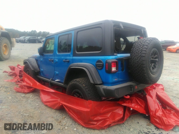 2021 Jeep Wrangler Unlimited Rubicon with VIN 1C4JJXFG3MW833275, listed as a IAAI auction lot 39371948 with 43,428 mi miles. Bid and sale history available at carsss.com. Image 3.