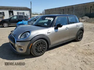 2019 MINI Hardtop 4 Door Cooper with VIN WMWXU1C52K2J02579, listed as a Copart auction lot 53507295 with 94,350 mi miles and Salvage Title. Bid and sale history available at DreamBid. Image 1.