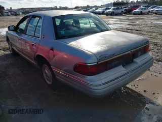 1996 Mercury Grand Marquis GS with VIN 2MELM74W7TX616694, listed as a IAAI auction lot 41216582 with 127,486 mi miles and . Bid and sale history available at DreamBid. Image 3.