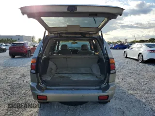 2002 Mitsubishi Montero z VIN JA4MT41R62J021195, wystawiony jako Copart lot #47021115 z przebiegiem 196 795 mil mil oraz Szkoda całkowita • Salvage title. Historia ofert i sprzedaży dostępna na DreamBid. Obrazek 6.