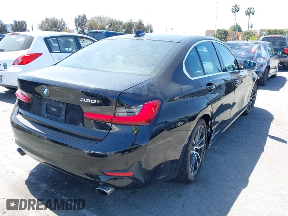 2019 BMW 3 Series 330i xDrive with VIN WBA5R7C5XKAJ78505, listed as a IAAI auction lot 41955059 with 53,216 mi miles. Bid and sale history available at carsss.com. Image 4.