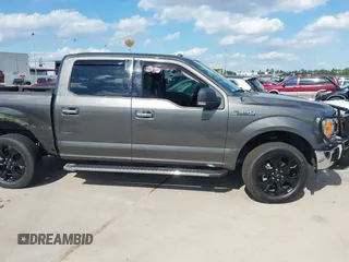 2018 Ford F-150 XL z VIN 1FTEW1E59JKC63060, wystawiony jako IAAI lot #42171237 z przebiegiem 113 405 mil mil oraz . Historia ofert i sprzedaży dostępna na DreamBid. Obrazek 13.
